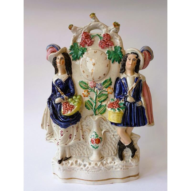 Staffordshire Pottery fruit sellers clock face group